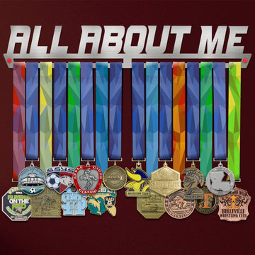 All About Me Medal Hanger Display holding colorful ribbons and various sports medals, ideal for organizing achievements in style.